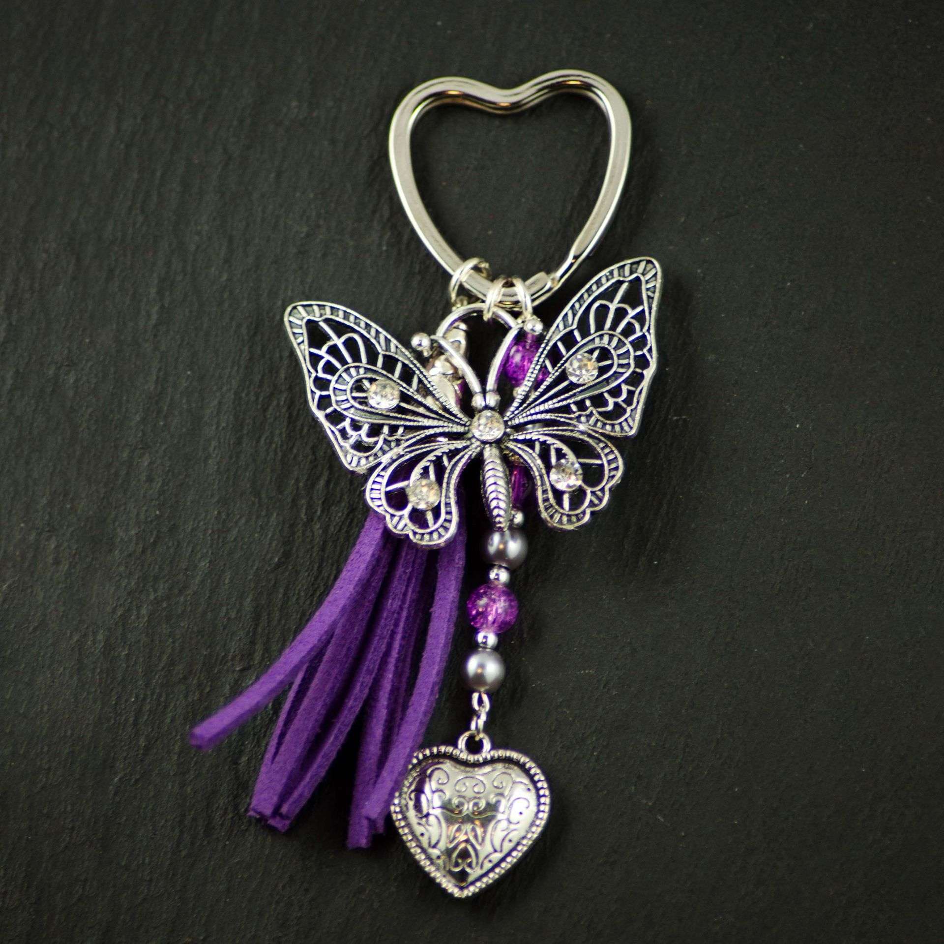 compressed-PC papillon pompon violet